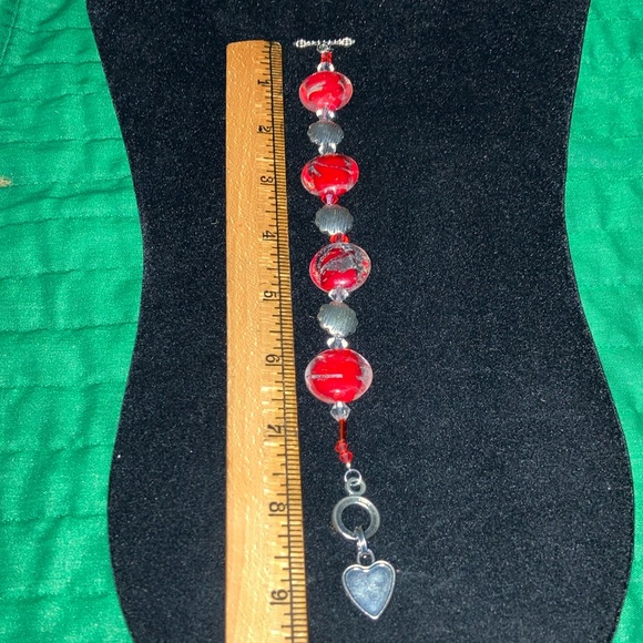 HAND CRAFTED MURANO red w/silver glass and st round beads w/toggle closing.  $30 - Picture 3 of 6